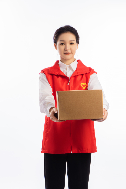 忙碌的红马甲志愿者高清图版权图片下载