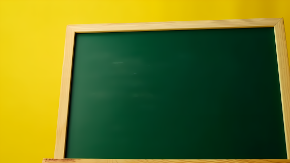 绿板黄底的教材教辅黑板摄影图