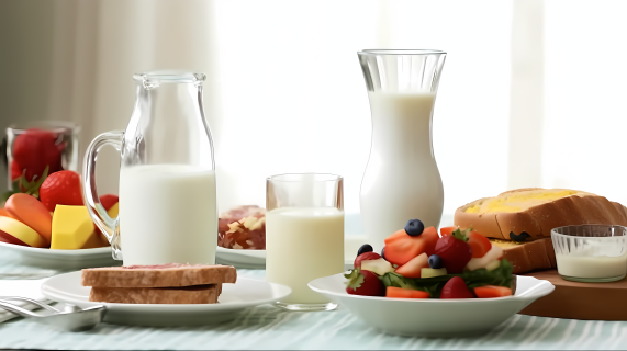 牛奶面包水果营养早餐摄影图