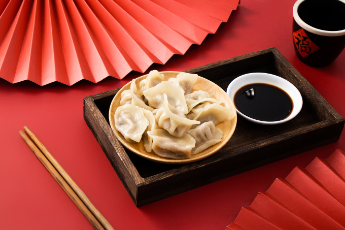 红色扇子饺子醋高清图