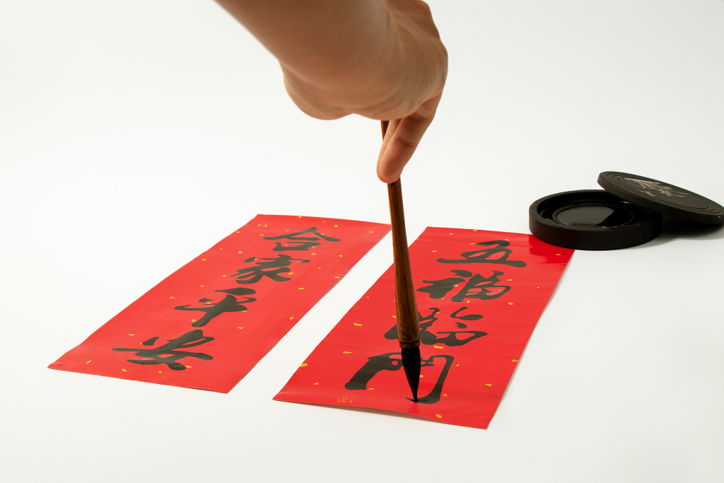 手写传统过年习俗春联高清图版权图片下载