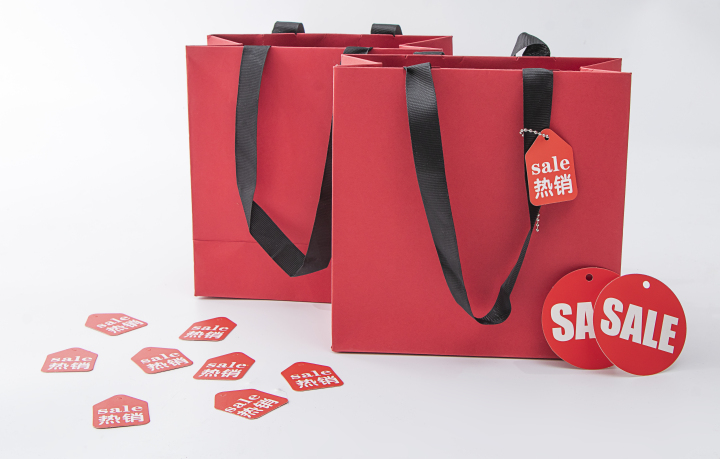 红色电商购物促销活动袋子实拍图版权图片下载