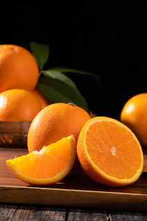 创意新鲜切片超甜橙子摆放实拍图
