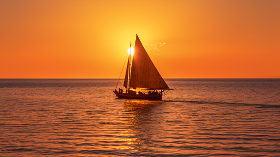 坦桑尼亚落日中飘荡的帆船摄影图