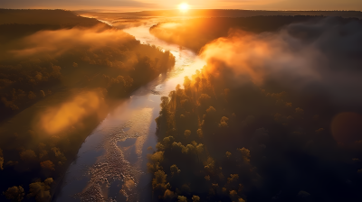 雾蒙蒙河流的日出美景摄影图