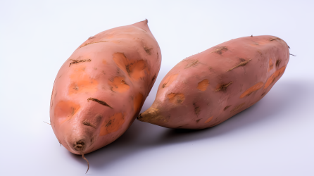 两个胖乎乎的红薯美食摄影图