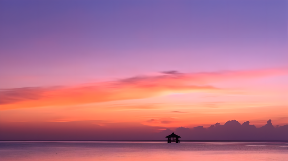 马尔代夫桑娜海滩的日落摄影图片