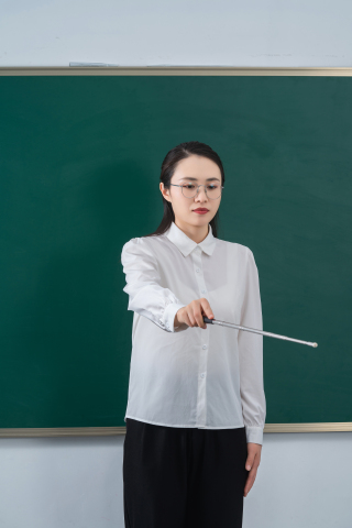 真实感女教师上课摄影图 