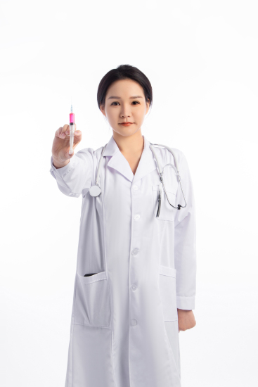 白色工装女医生单手点赞高清图