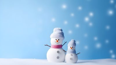 蓝色背景上的两个雪人高清图