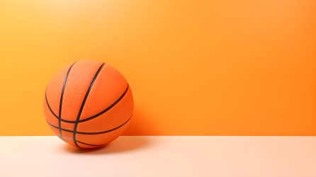 橙色背景下的篮球图片