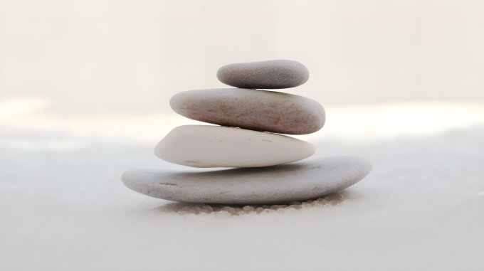 白砂中的四块叠石艺术感摄影图