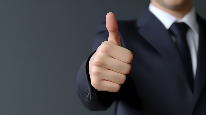 商务手势竖大拇指高清摄影图