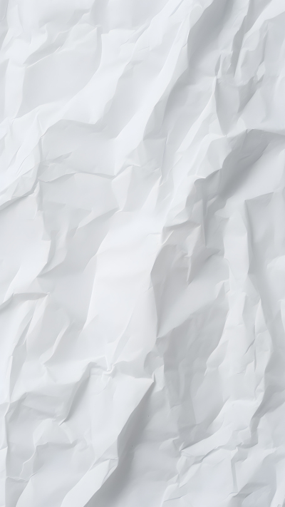 揉皱的白纸纹理背景